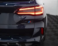 BMW X5 M — Dark blue, rear badge and taillight detail