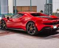 Ferrari 296 GTB — Red, rear three-quarter view