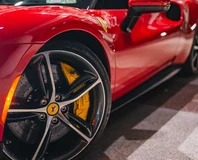 Ferrari 296 GTB — Red, wheel and yellow brake caliper