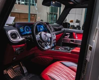Mercedes-AMG G 63 — Silver, driver seat and red cabin