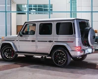 Mercedes-AMG G 63 — Silver, rear three-quarter view