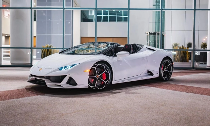 Lamborghini Huracan EVO Spyder — White, front three-quarter view with roof open