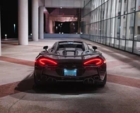 McLaren 570S Spider — Black, rear view