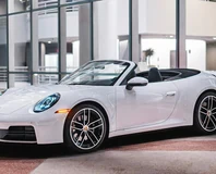 Porsche 911 Carrera Cabriolet — White, close front three-quarter view