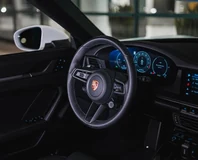Porsche 911 Carrera Cabriolet — White, driver cockpit