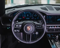 Porsche 911 Carrera Cabriolet — White, steering wheel and dashboard