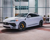White Lamborghini Urus Rental in Miami, front three-quarter view