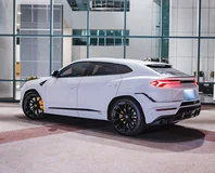 Lamborghini Urus — White, rear three-quarter view