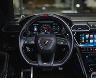Lamborghini Urus — White, steering wheel and dashboard
