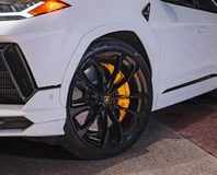 Lamborghini Urus — White, wheel and yellow brake caliper